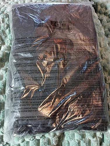 Customer photo showing Amazon Essentials fleece sweatpants in daily use