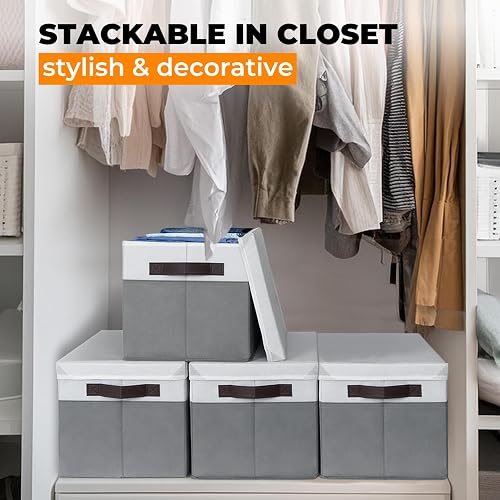Three Criusia bins stacked on a closet shelf with their lids on and one lid tilted open