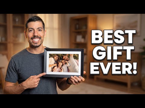 FLYRUIT digital picture frame displaying family photos on a 15.6-inch touchscreen