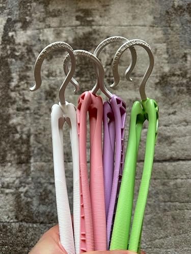 Customer photo showing foldable hangers used for air drying clothes