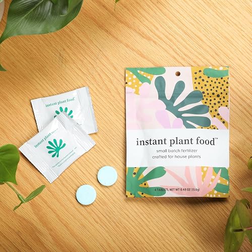 Instant Plant Food Tablets pouch and tablets laid out on a table