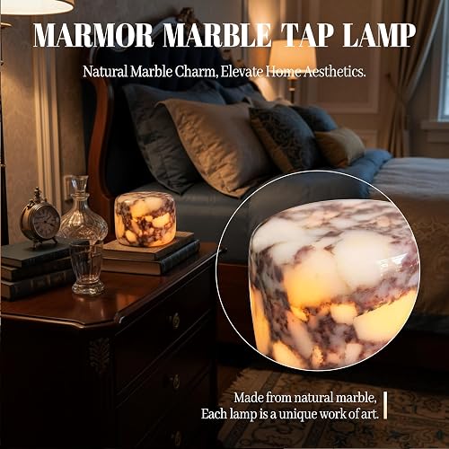 Marmor Marble Table Lamp glowing on a bedroom nightstand with a close-up of its natural marble veining
