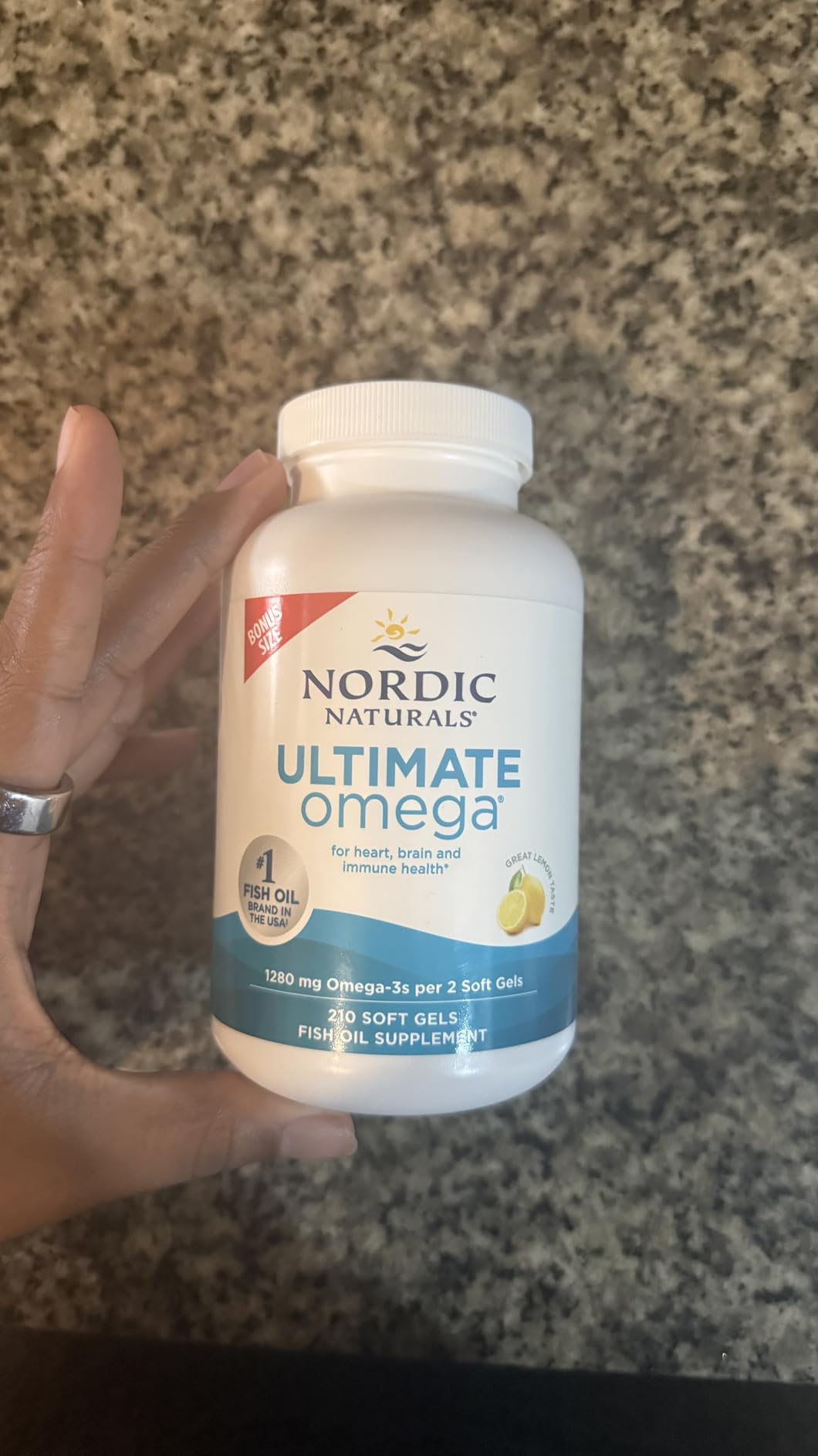 Customer photo showing Nordic Naturals bottle and softgels