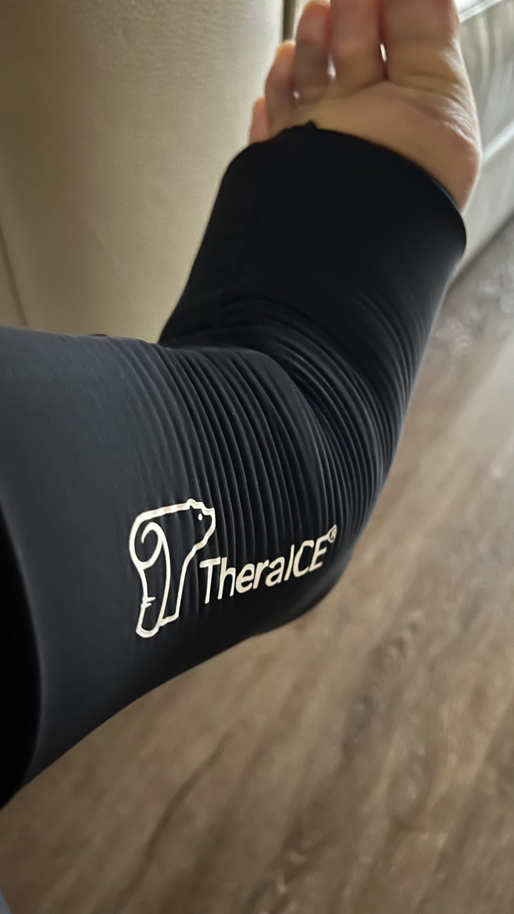 Customer photo showing TheraICE ankle wrap coverage