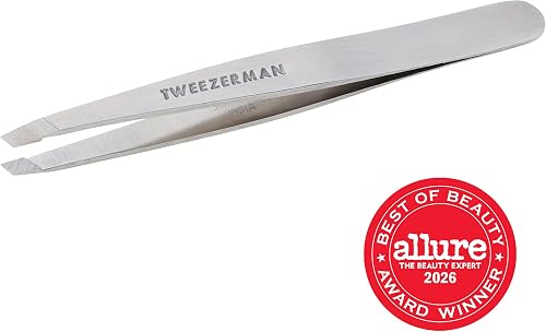 Close-up of the silver Tweezerman stainless steel slant tweezer and its hand-filed slanted tip